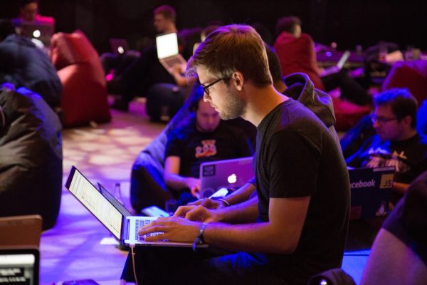 man on laptop discovering Consciousness creates matter scientific facts proof thoughts can and do form reality